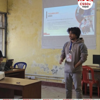 Sujal Karki presenting at a technology event